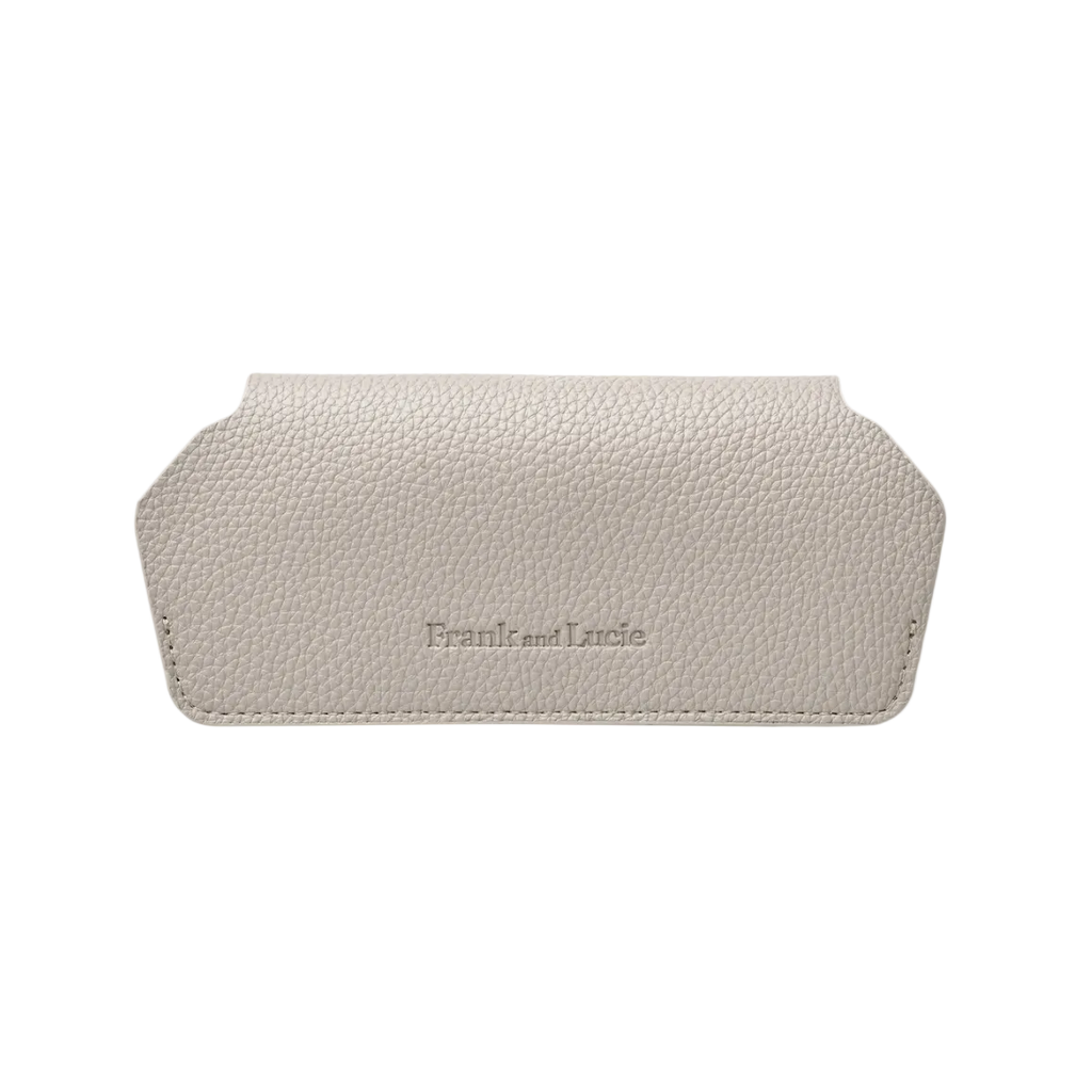 A light beige pebbled leather eyeglasses case with the brand name 'Frank and Lucie' embossed on the front, shown against a plain white background.