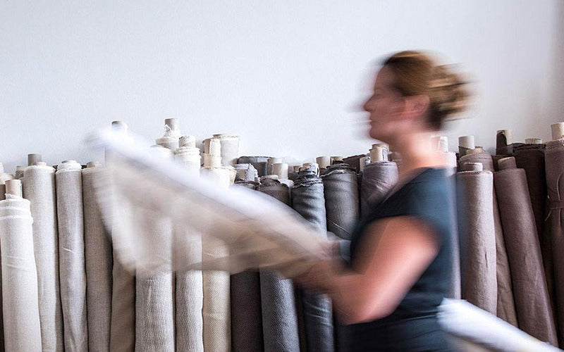 Craftsman at work on upholstery