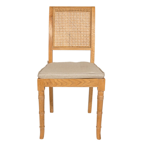 The Marseille dining chair is made out of Natural Oak Wood with caning back rest. It comes with a comfortable linen cushion that is removable and washable.  Ideally combined with the Versailles extendable dining table.  Made in Belgium  Brand : PR-Living  Model : Chair  Material : Solid Oak  Colour : Weathered Oak  Dimension : 43X40X90h