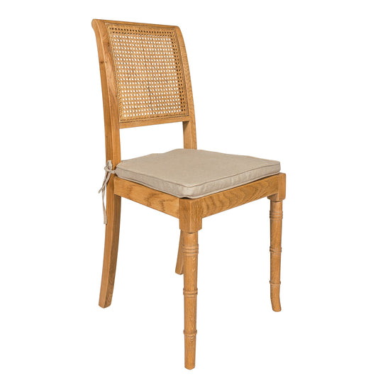 The Marseille dining chair is made out of Natural Oak Wood with caning back rest. It comes with a comfortable linen cushion that is removable and washable.  Ideally combined with the Versailles extendable dining table.  Made in Belgium  Brand : PR-Living  Model : Chair  Material : Solid Oak  Colour : Weathered Oak  Dimension : 43X40X90h