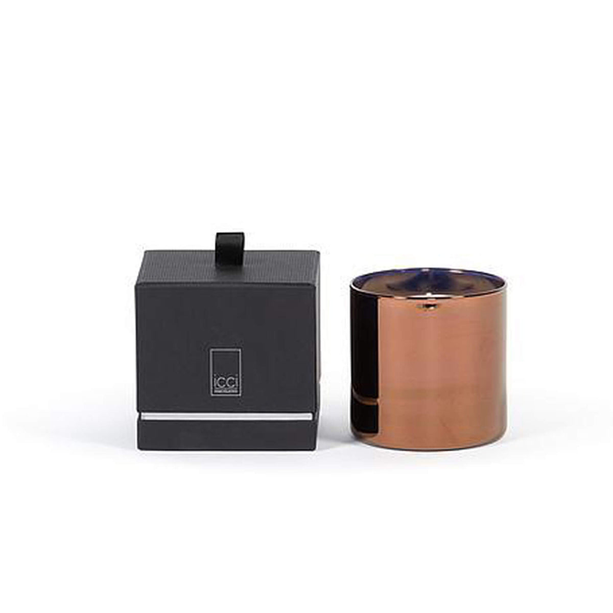 Deko Candle scented candle in a cylindrical metal votive