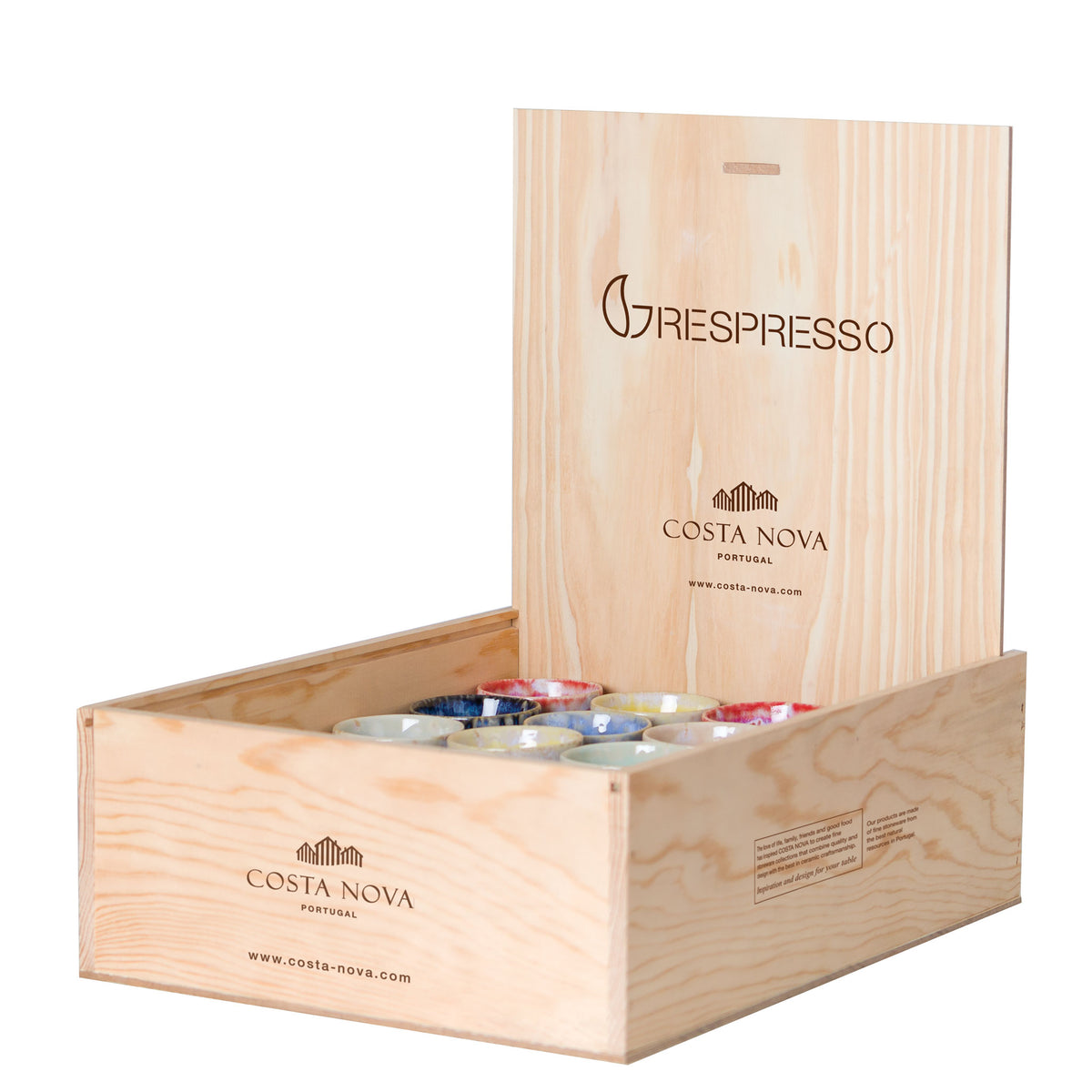 A set of multicolored espresso cups presented in an open wooden crate with the branding 'Grespresso' and 'Costa Nova'.